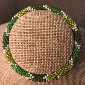 Infinity green beaded bracelet